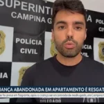 Viatura policial e equipe do Conselho Tutelar em frente a prédio residencial em Campina Grande