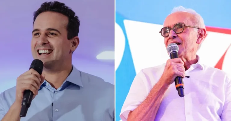 Candidatos políticos paraibanos em centro de convenções durante divulgação de pesquisa eleitoral apertada.