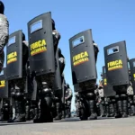 General do Exército e presidente do TRE-PB em reunião estratégica sobre segurança eleitoral.