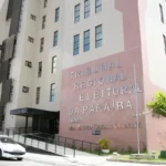 Reunião de planejamento integrado de segurança para eleições 2026 com representantes do TRE-PB e forças de segurança.